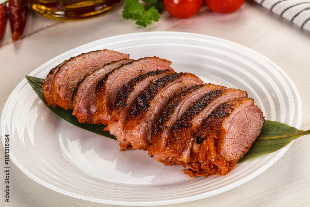 Sliced duck breast baked with cherry Sliced duck breast baked with cherry
