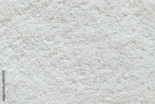 Close-up of soft beige textile texture with a fluffy, curly surface, ideal for backgrounds, fabric design, or cozy-themed concepts. The material evokes warmth and comfort.