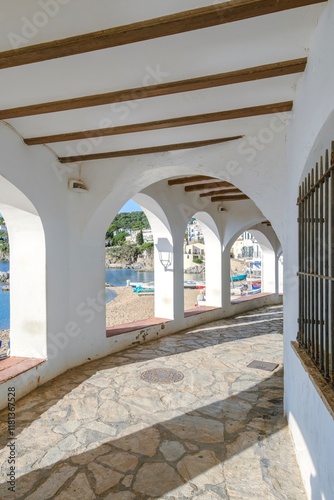 'Carrer de les Voltes', seafront promenade In the Historic and Tourist Town of Calella de Palafrugell, Costa Brava, Catalonia photo