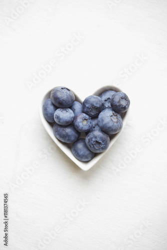 Blueberries in a heart shaped bowl
 photo