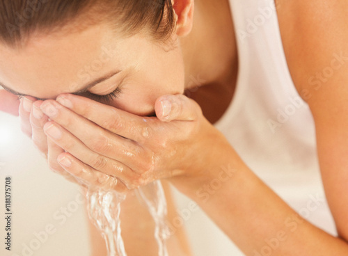 Woman Washing Face, Close-up view
 photo