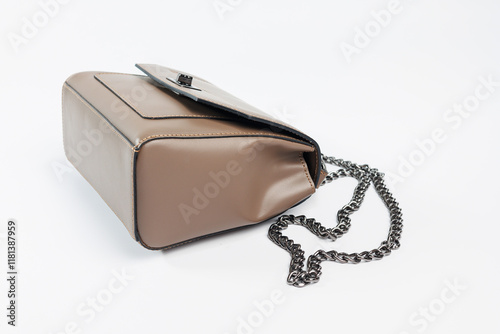 Beige leather women's handbag, Women's bag, beige women's bag. Women's bag isolated on white background. The bag is isolated on a white background. photo