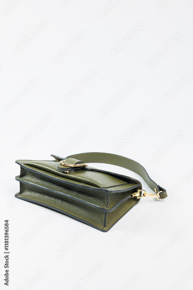 Green leather women's handbag, women's bag, green women's bag. Women's bag isolated on white background. The bag is isolated on a white background.