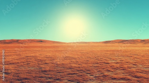 Expansive golden grassland under a hazy sky at dawn in an open landscape