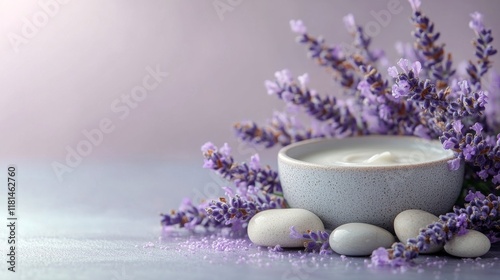Natural skincare cream surrounded by lavender and stones in a serene outdoor ...
