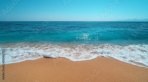 Calm turquoise ocean waves gently lapping at a serene sandy beach under a cle...