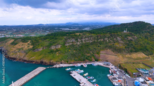 The beautiful island, Chagwido Island, and Wawa of Jeju Island in Korea are taken with drones from the sky, the sea, waves, and beautiful nature photo