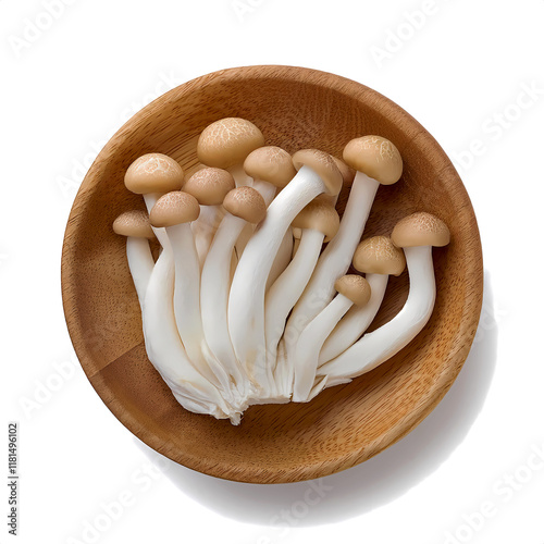 Cluster of hon shimeji (Lyophyllum shimeji) in a wooden bowl, isolated on white background photo