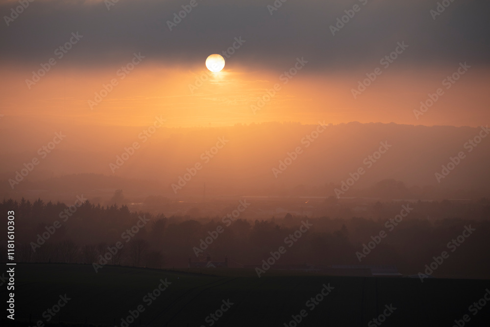 Sunset over Stonehaven in Scotland captures the beauty of twilight and the transitioning light on the horizon Sunset over Stonehaven in Scotland captures the beauty of twilight and the transitioning light on the horizon