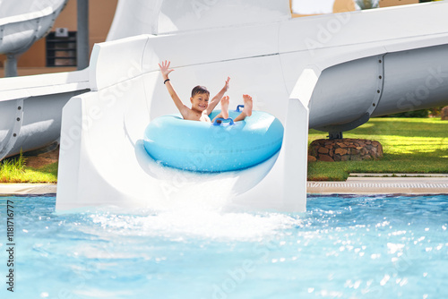 Boy having fun on water slides in Egypt Hurghada