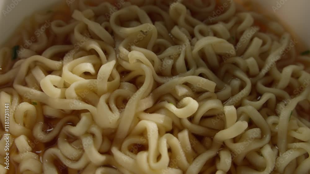 Close-up Shot of Cooked Instant Noodles in Broth Close-up Shot of Cooked Instant Noodles in Broth