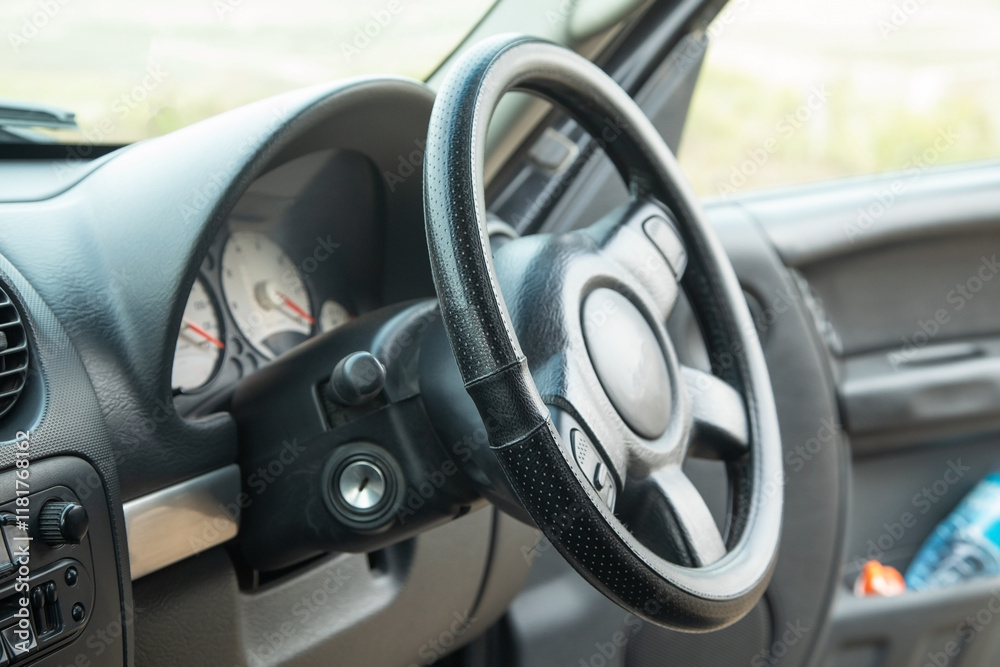 View of car with the steering wheel. View of car with the steering wheel.