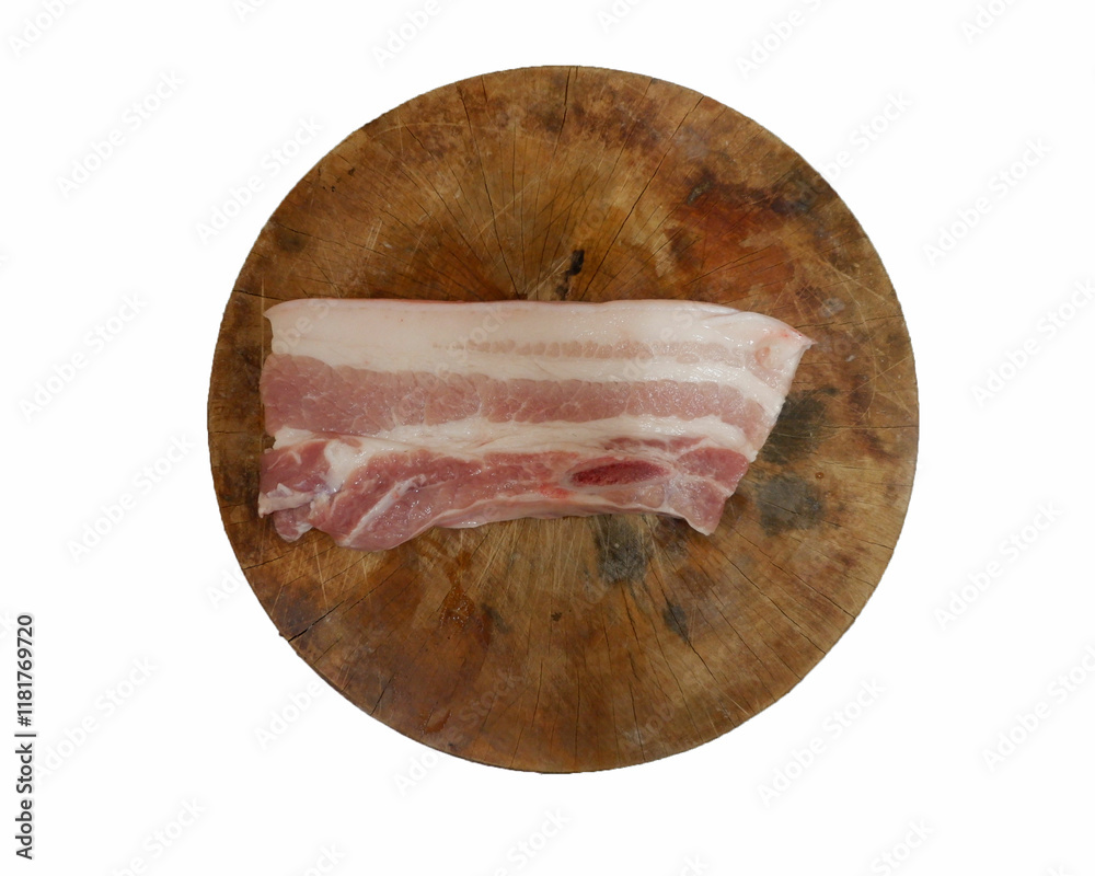 Pork placed on a cutting board ready to cook. Pork placed on a cutting board ready to cook.
