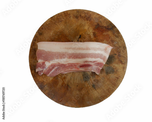 Pork placed on a cutting board ready to cook.