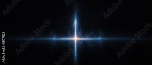 A blue light is shining on a dark background