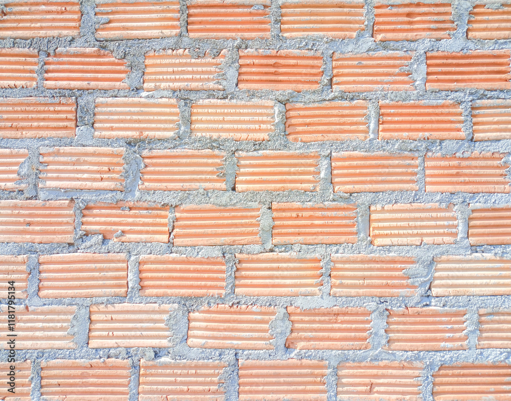 A minimalist, comfortable photograph of a red brick wall background with bare concrete that is not plastered. It is simple but still beautiful and natural in a Thai style. It is used as an example for A minimalist, comfortable photograph of a red brick wall background with bare concrete that is not plastered. It is simple but still beautiful and natural in a Thai style. It is used as an example for