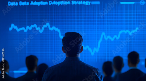 Wallpaper Mural A person observes a digital screen displaying a data adoption strategy graph, emphasizing analytics and decision-making in a business context. Torontodigital.ca