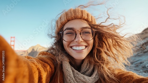 Joyful woman enjoys a sunny day at Golden Gate Bridge in San Francisco photo