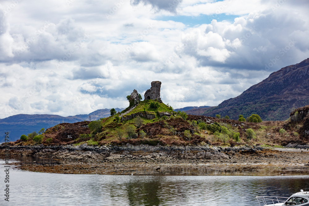 Exploring the Ruins of an Old Castle on the Isle of Skye in Scotland Surrounded by Stunning Natural Landscapes Exploring the Ruins of an Old Castle on the Isle of Skye in Scotland Surrounded by Stunning Natural Landscapes