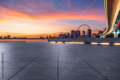 Obraz na płótnie Empty square floor with modern city buildings scenery at sunset. Outdoor city background. w salonie