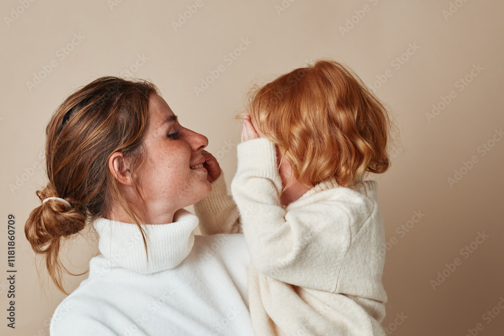 Mother and daughter embracing in matching white turtlenecks, family love and connection, fashion and beauty concept Mother and daughter embracing in matching white turtlenecks, family love and connection, fashion and beauty concept