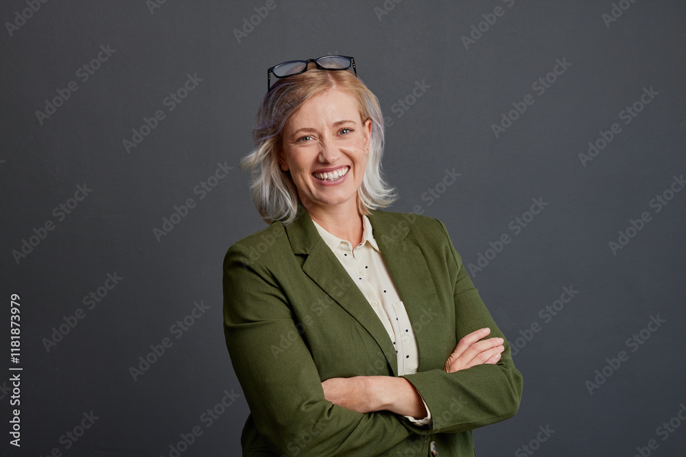 © Rido - Portrait of confident mature woman isolated on gray wall © Rido - Portrait of confident mature woman isolated on gray wall