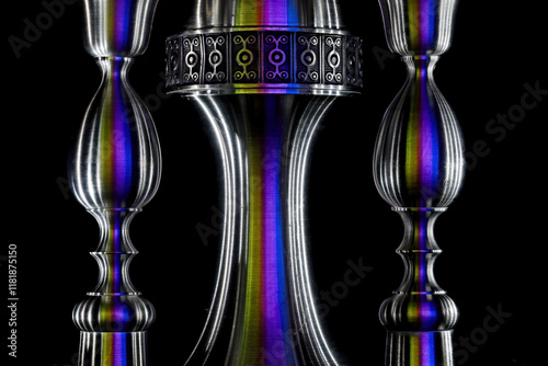 Tin candle sticks and a vase with colorful lightning