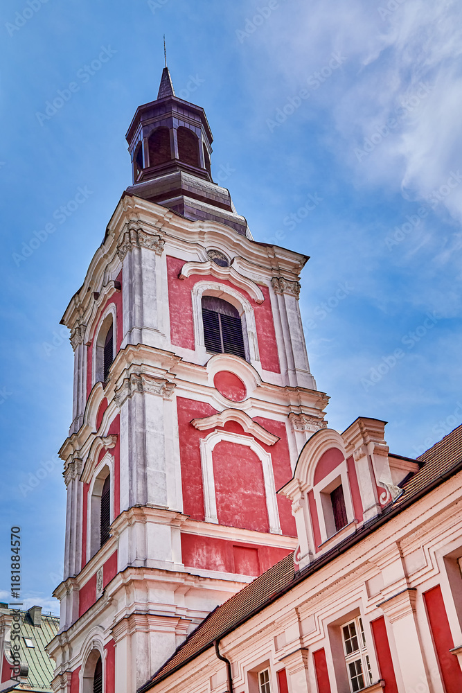Fototapeta premium Courtyard and bell tower of the basilica Collegiate Church or simply know as Fara. It is a Roman Catholic basilica located in the heart of the Old Town district in Poznan, Europe, Poland