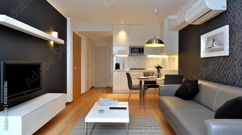 Stylish living area in Antalya showcases gray wallpaper  a comfortable sofa  and a sleek kitchen  perfect for relaxed living