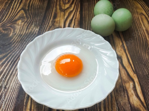 Duck eggs on a wooden table photo