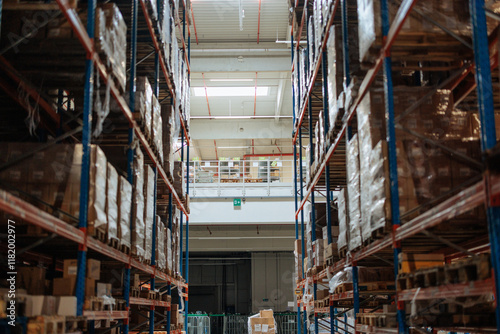 Large warehouse with organized shelves and mezzanine level
