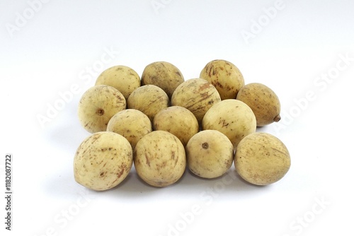 A group of Duku fruits or lanzones or Lansium domesticum on a white background.  photo