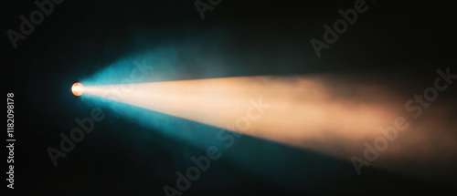 Spotlight creates dramatic light cone beams in a dark atmospheric setting