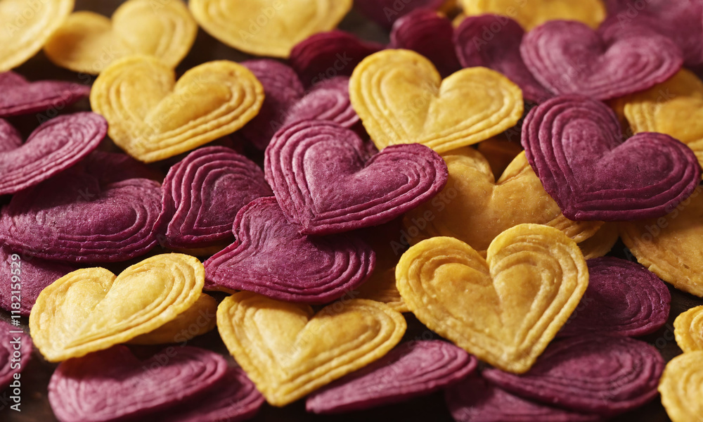 Colorful heart-shaped chips made from beets and corn provide a fun snack option for festive occasions. Valentine’s Day idea, date, engagement party, love party, eat, food