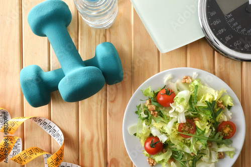 Good nutrition exercise and weight control with equipment top view