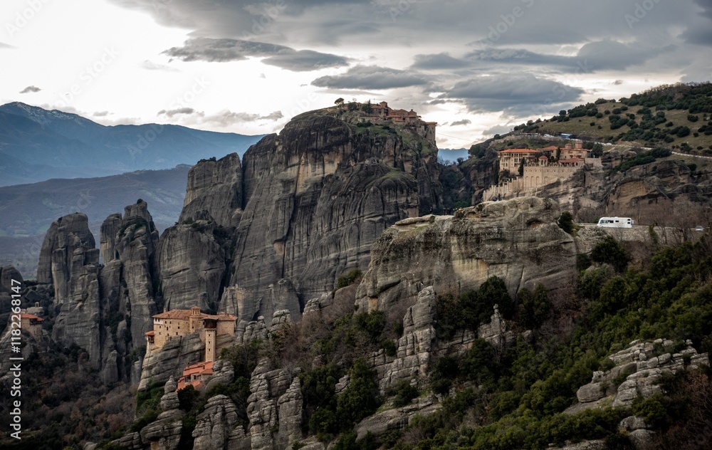 Meteora monasteries view in the winter with dark colours. Greece Meteora monasteries view in the winter with dark colours. Greece
