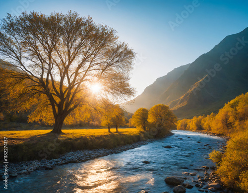 Golden Valley Serenity, A tranquil river flows beneath a sprawling golden tree with majestic mountains in the distance at sunset, A serene autumn landscape ideal for nature and outdoor photography lov photo