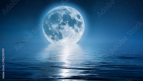 full moon over the ocean with moonlight reflection on water
