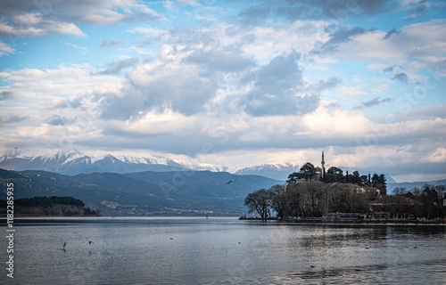 Ioannina lake: Greece undiscovered gem. Ottoman legacy. Snowy mountains. Mosque photo