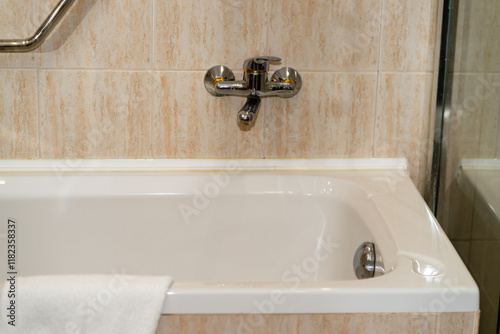 Clean bathroom modern bath. Hotel bathtub photo