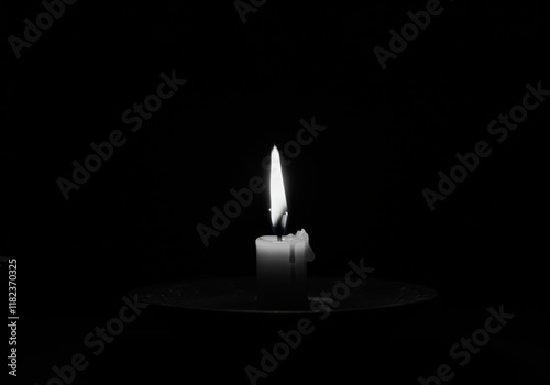 Wallpaper Mural single candle flame, dark background, black and white photography, minimalist, dramatic lighting, contrast, solitude, reflection, atmospheric, moody, contemplative, shadows, simplicity, spiritual, med Torontodigital.ca