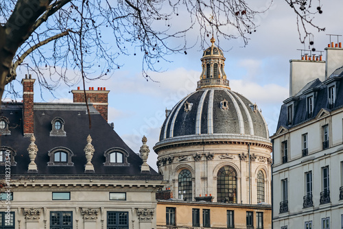 Photography A view of Paris rooftops and the dome of the Institut de France