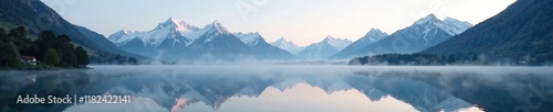Misty lake surface with Zugspitze peaks reflected, serene atmosphere, reflection, landscape, tranquility