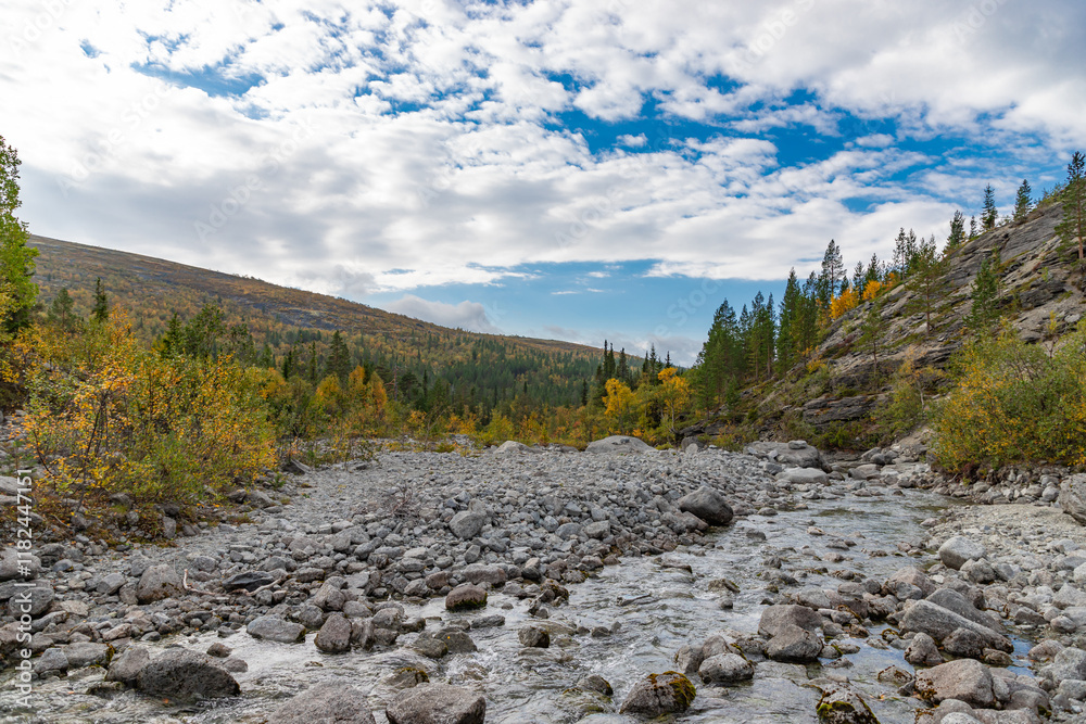 View to Mannepakhp river at Khibiny mountains. Early autumn in arctic tundra region. Kola peninsula, Murmansk region, Russia.