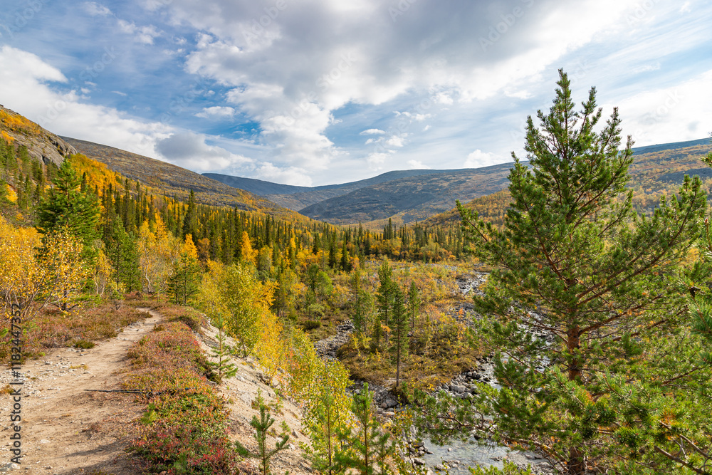 View to Mannepakhp river at Khibiny mountains. Early autumn in arctic tundra region. Kola peninsula, Murmansk region, Russia.