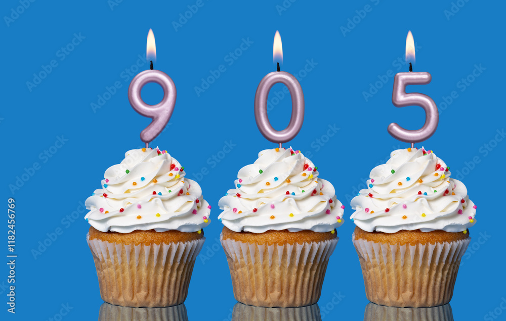Birthday Cupcakes With Candles Lit Forming The Number 905