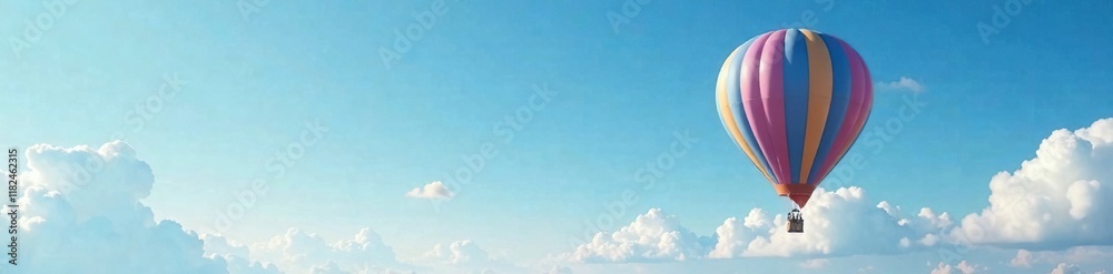 Naklejka premium Hot air balloon suspended high above ground level amidst clear blue skies and fluffy white clouds, cloudy sky, hot air balloon