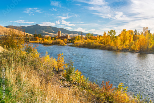 Panoramic view from the Riverfront Trail along the Clark Fork River of the University District and tower of the Boone Crockett Club Natural History Museum in downtown Missoula, Montana.	 photo