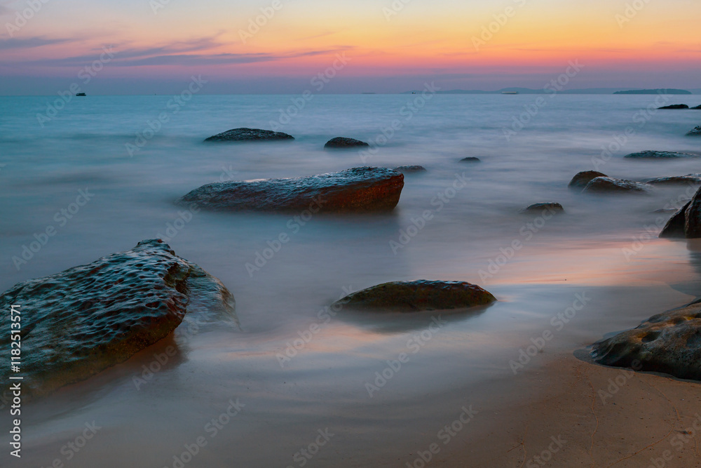Naklejka premium Sunrise over the sea on the coast of Cambodia