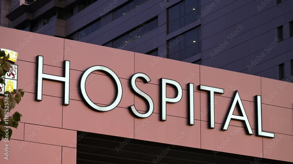 Health Care Hospital Sign And Modern Building Exterior Health Care Hospital Sign And Modern Building Exterior